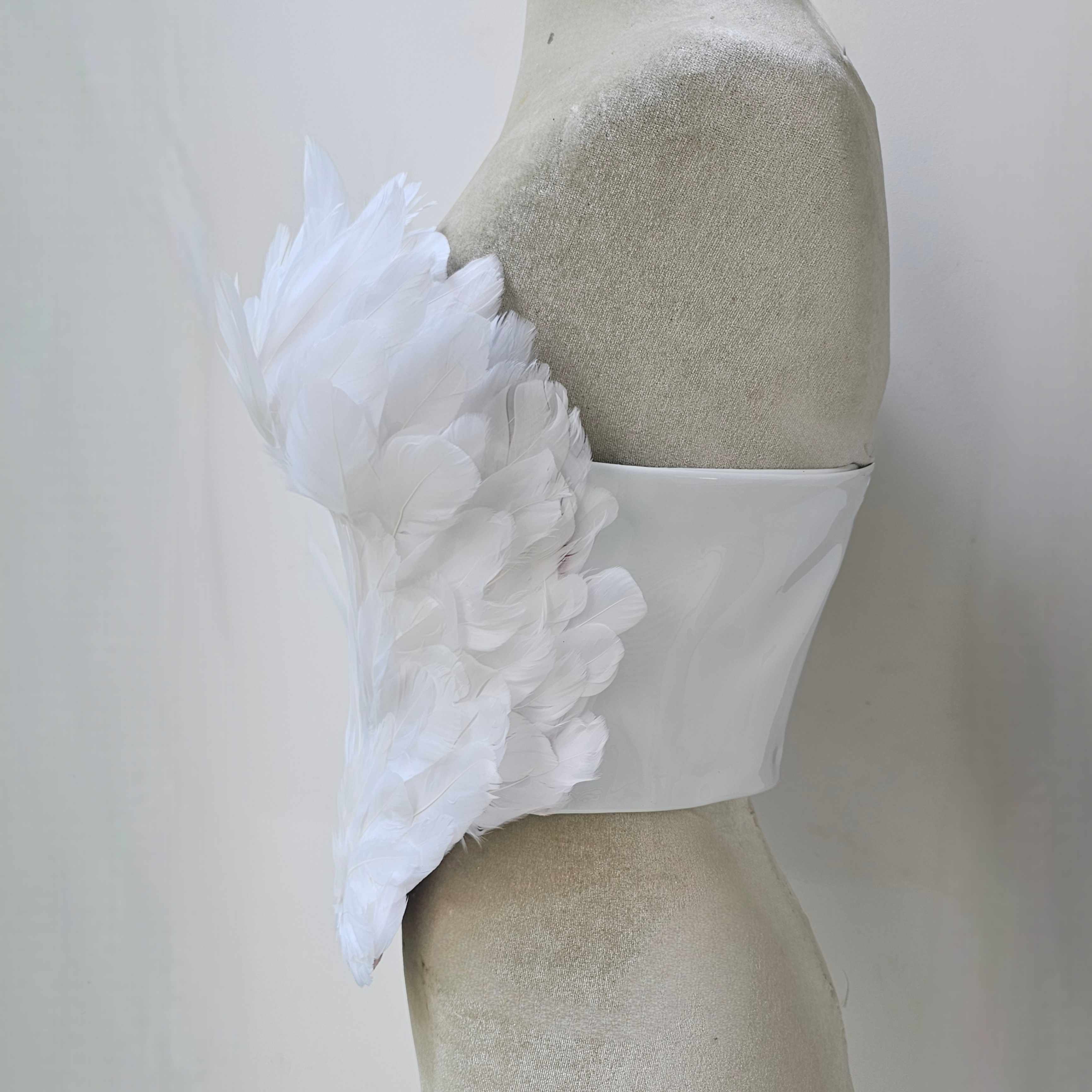 Peto Hécate Plumas